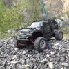 <strong class='magnific-title'>Camo Slash</strong> Slash 1/16 with a camo Summit body in a quarry.