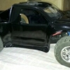 <strong class='magnific-title'>short course truck</strong> my is, Pro-Line StreetFighter  tires, outlaw black painted body, traxxas motort 17t and the roller is team associated
sc10..