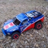 <strong class='magnific-title'>Slash 4x4</strong> Pro-Line Chevy Silverado body, under tray and Trenchers mounted on Split Six bead-locs. RPM front and rear bumpers, control arms and nerf bars.